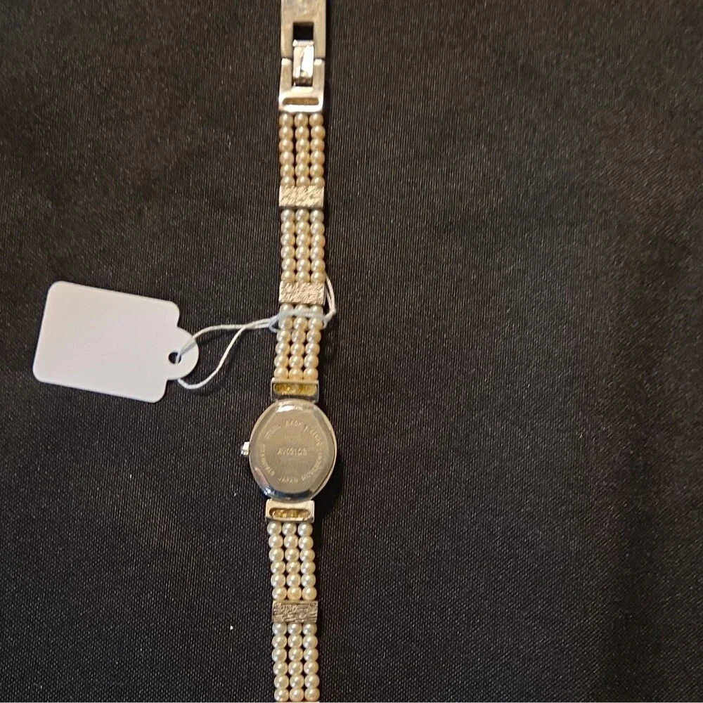 Women's Quartz Dress Watch Silver Oval Case White Dial Faux Pearl Bracelet